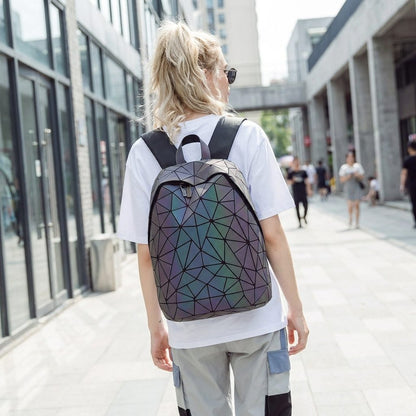 Woman wearing the GinaGlow geometric luminous backpack in the city