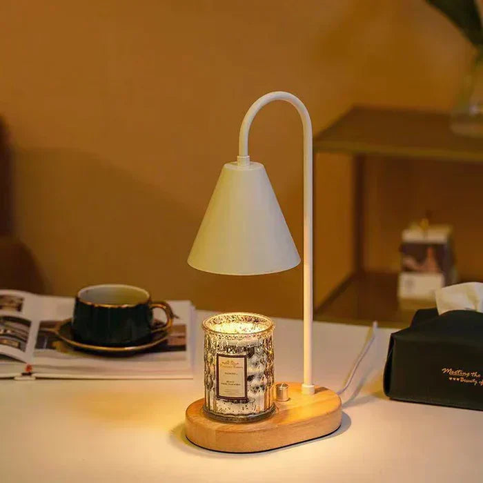 GlowHaven candle warmer lamp lighting a bedside table in the evening